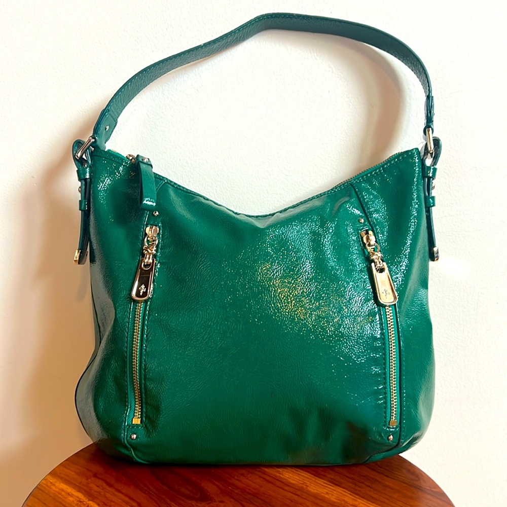 Cole Haan patent leather shoulder bag with gold hardware